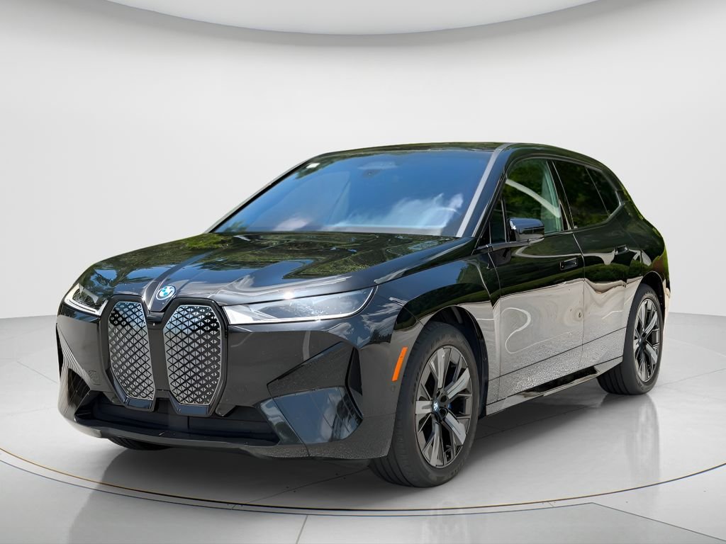 Used 2024 Black BMW xDrive50 image 1