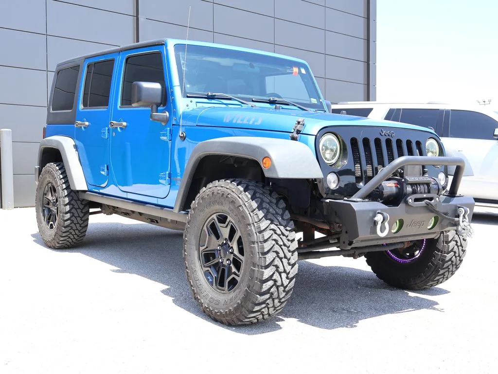 Used 2014 Blue Jeep Unlimited Sport image 6