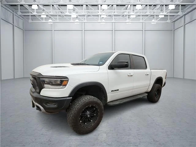 Used 2019 Bright White CL RAM Rebel 4x4 Crew Cab 144.5 in. WB image 1