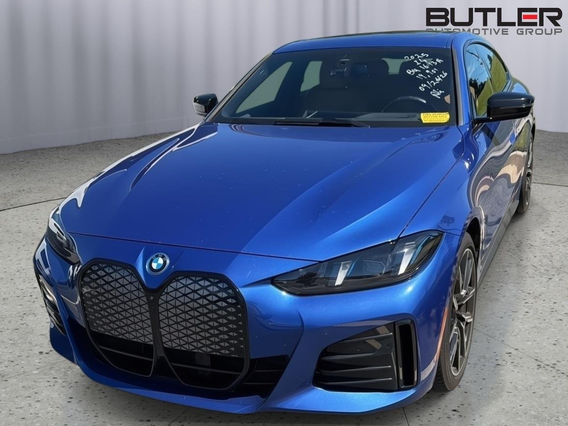 Used 2025 Portimao Blue Metallic BMW eDrive40 image 3