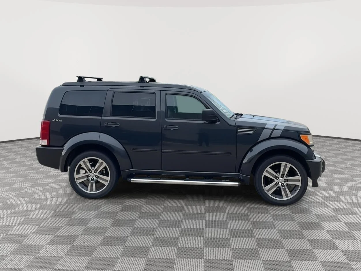 Used 2011 Dark Charcoal Pearlcoat Dodge Shock image 2