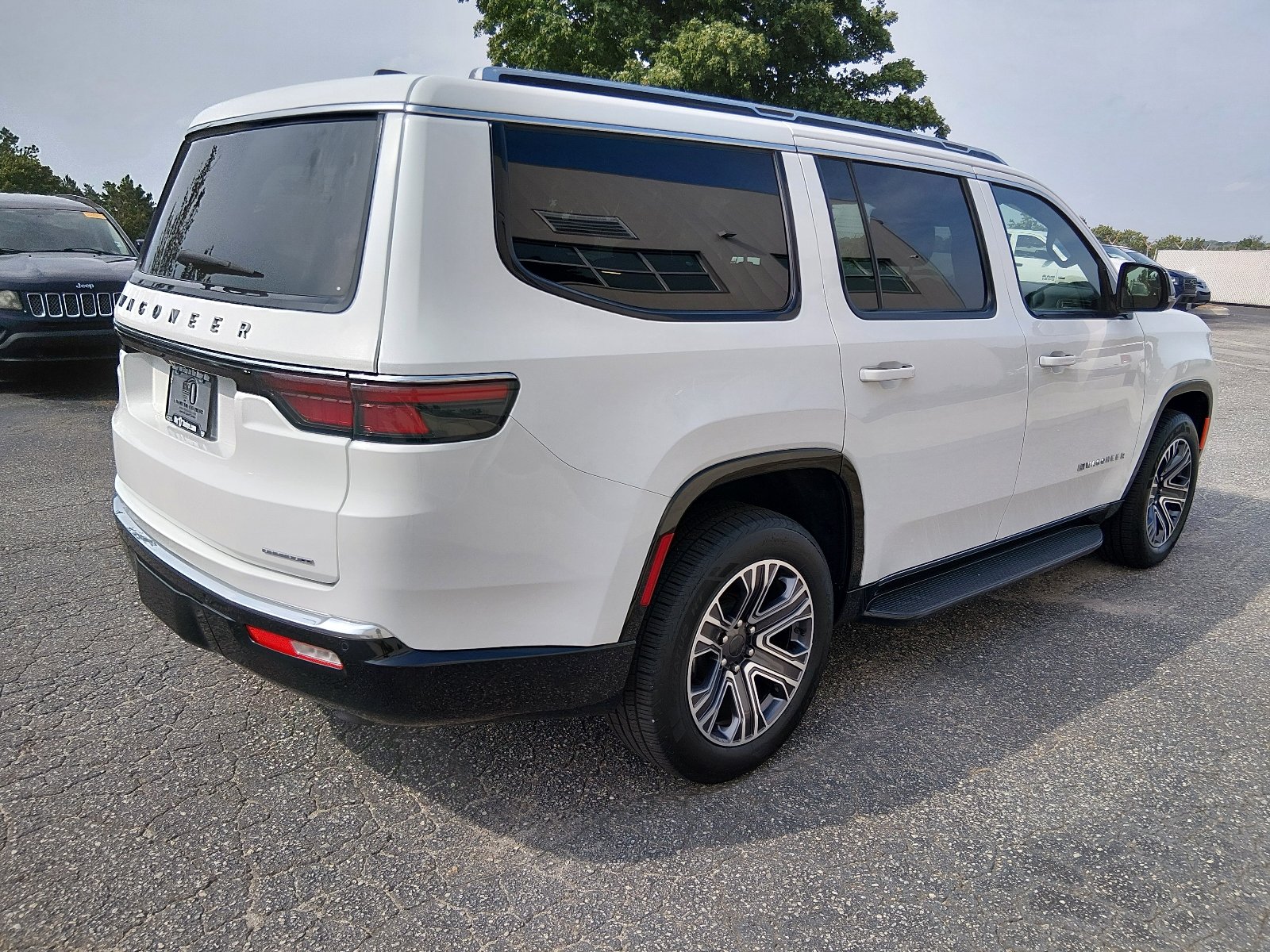 Used 2024 Bright White Clear Coat Jeep Series II image 3