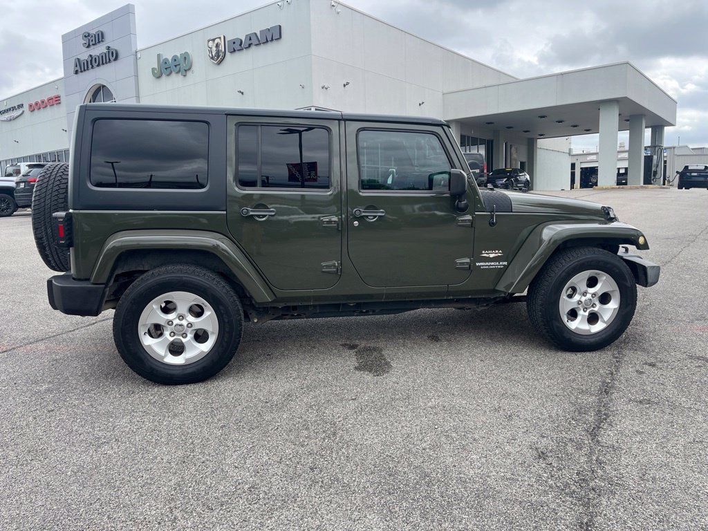 Used 2015 Green Jeep Unlimited Sahara image 8