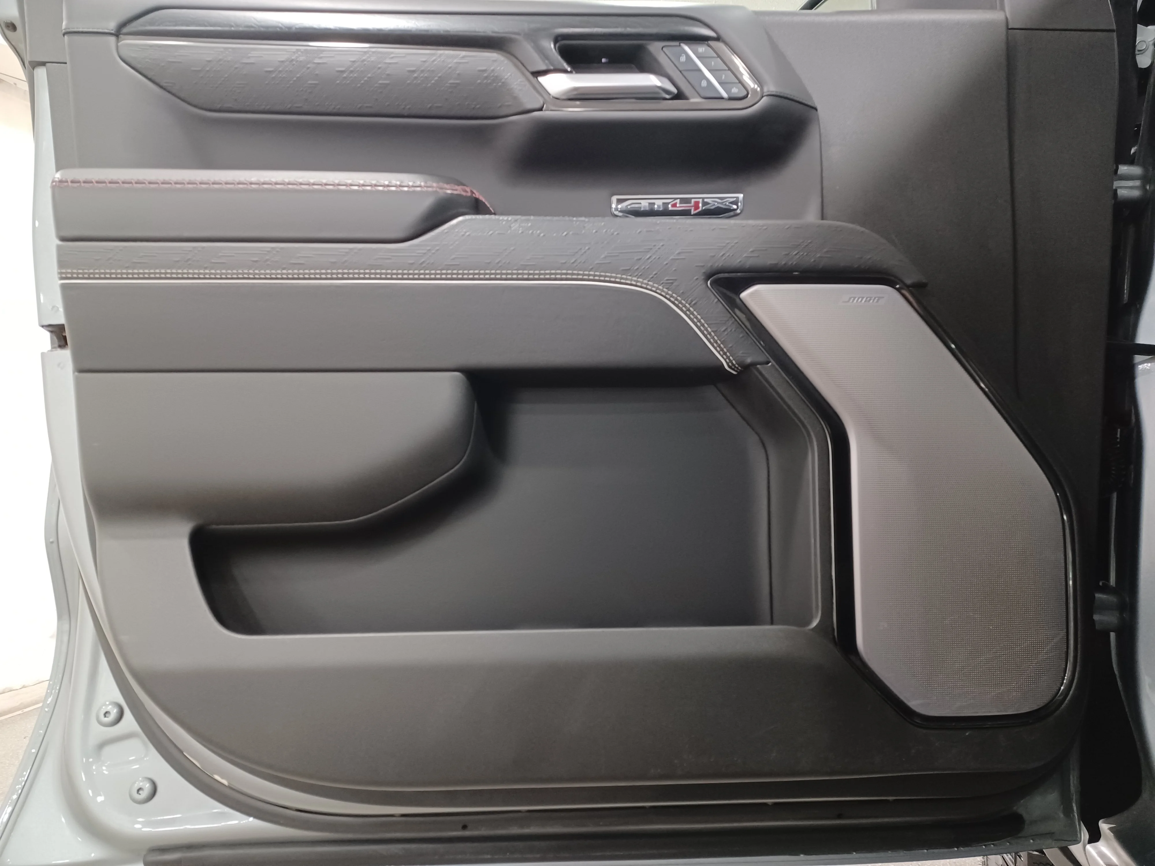 Used 2024 Sterling Metallic GMC AT4X 4WD*3.0L Duramax | Adaptive Cruise | Remote Start | Cooled Leather | Sunroof | Htd Wheel | AEV image 8