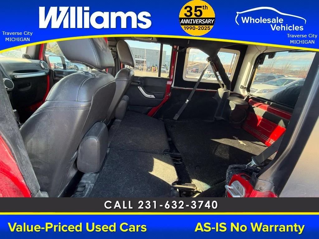 Used 2013 Flame Red Jeep Unlimited Sahara image 35