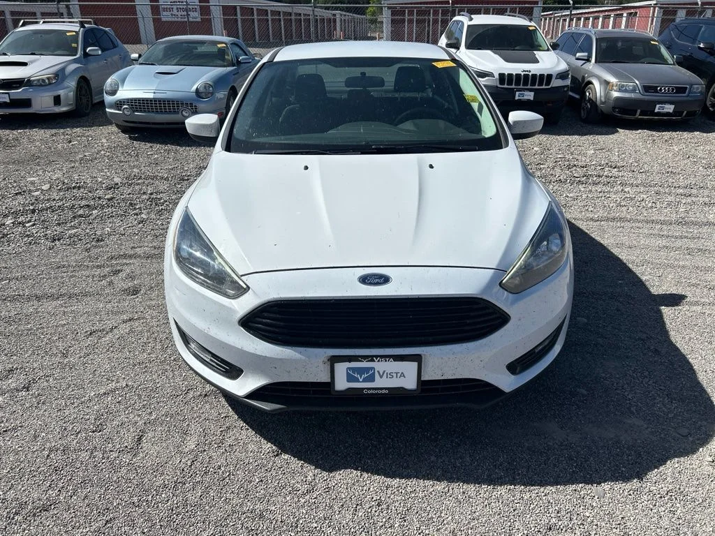Used 2018 Ford Focus SE with VIN 1FADP3F21JL268424 for sale in Delta, CO