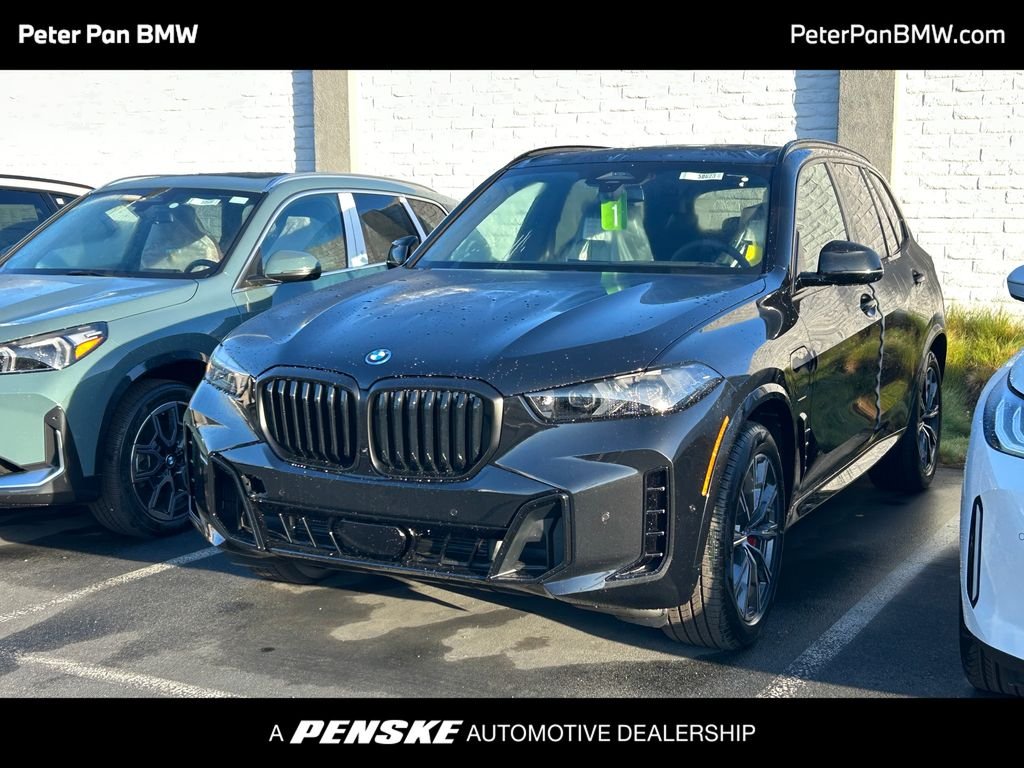 New 2026 Black Sapphire Metallic BMW xDrive50e image 1