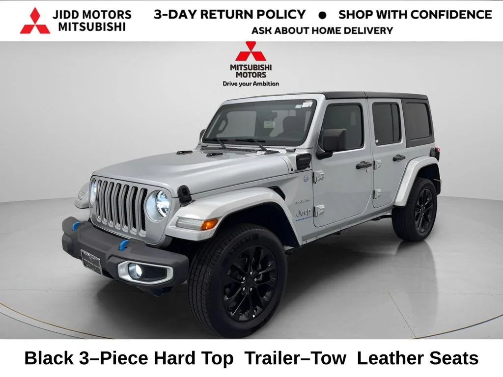 Used 2023 Silver Jeep Sahara 4xe image 1