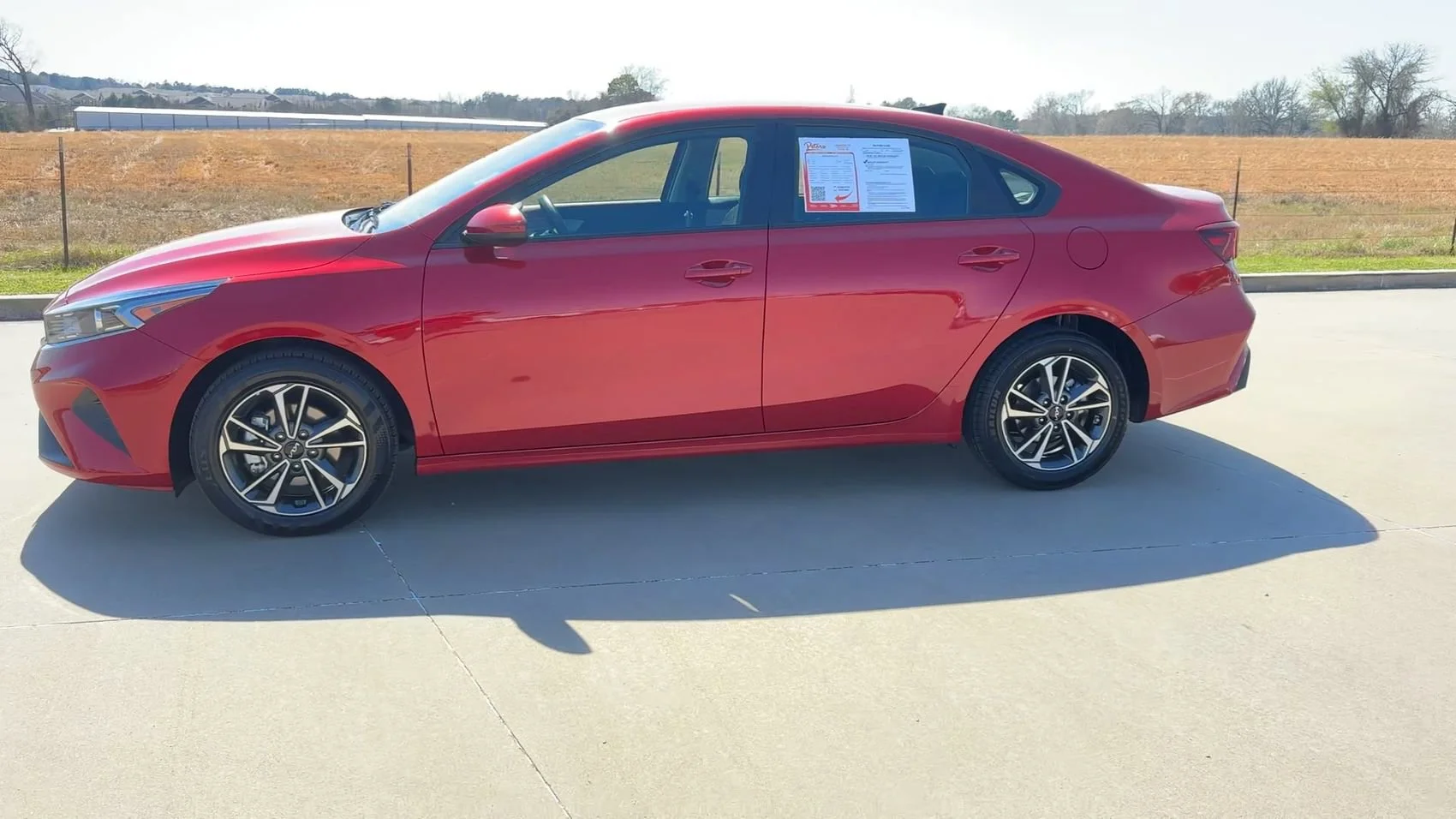Used 2024 Currant Red Kia LXS image 5