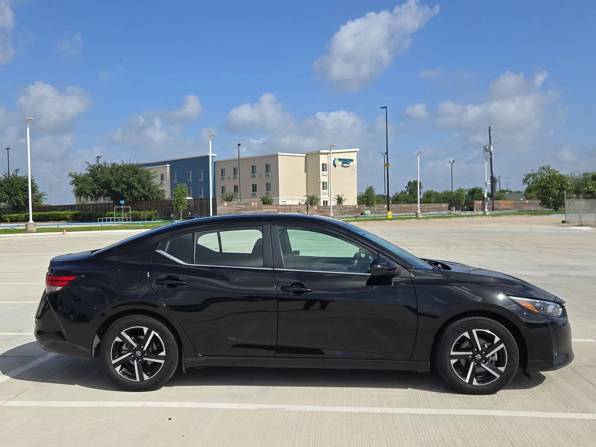 Used 2024 Super Black Nissan SV image 2