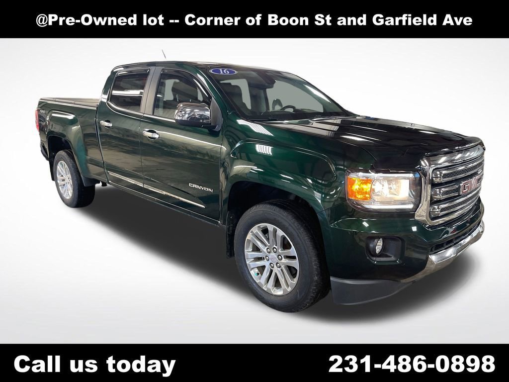 Used 2016 EMERALD GREEN METALLIC GMC 4WD SLT image 7