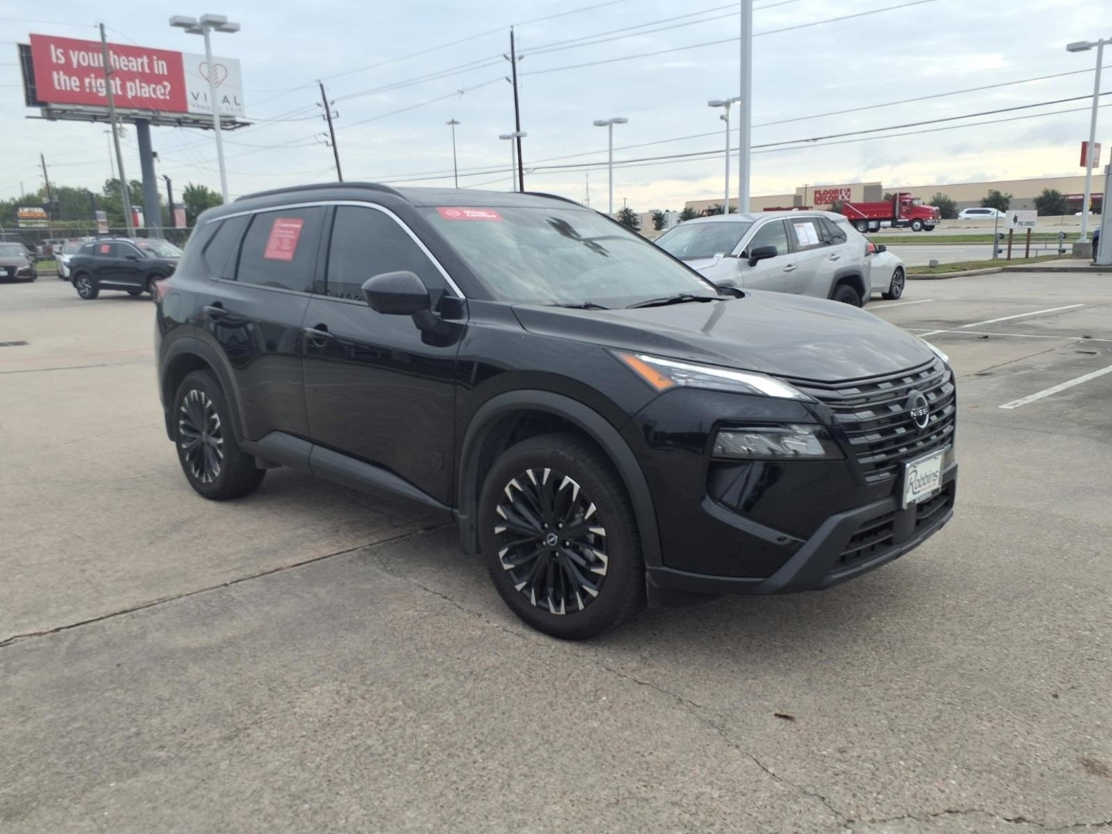 Certified Used 2026 Super Black Nissan Dark Armor image 3