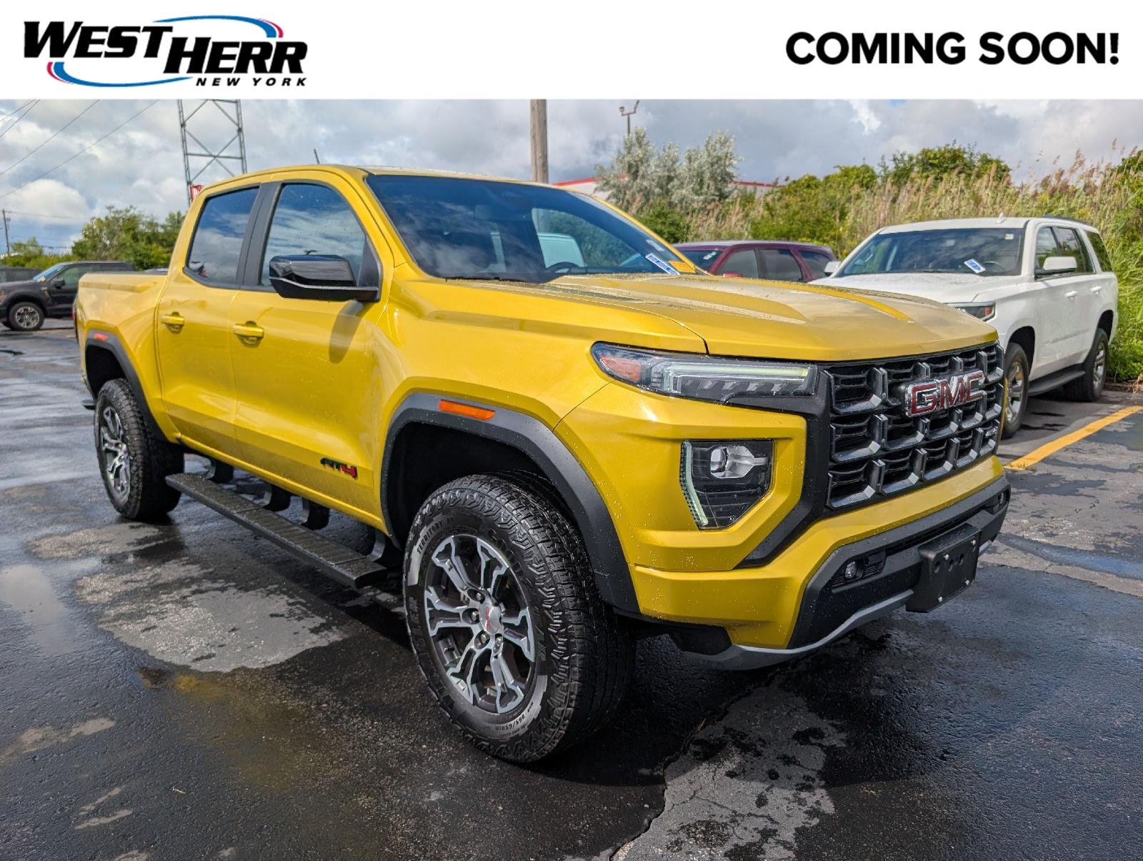 Used 2023 Solar Flare Metallic GMC 4WD AT4 image 1