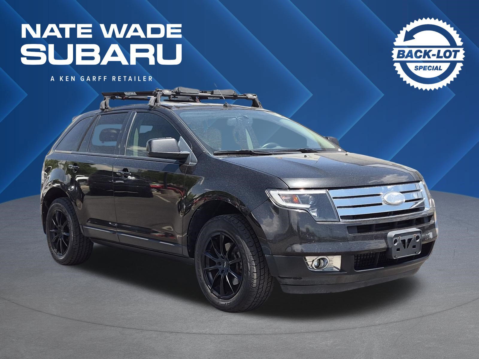 Used 2010 Black Ford SEL image 1