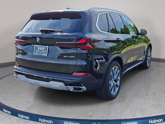 New 2026 Black Sapphire Metallic BMW xDrive40i image 4