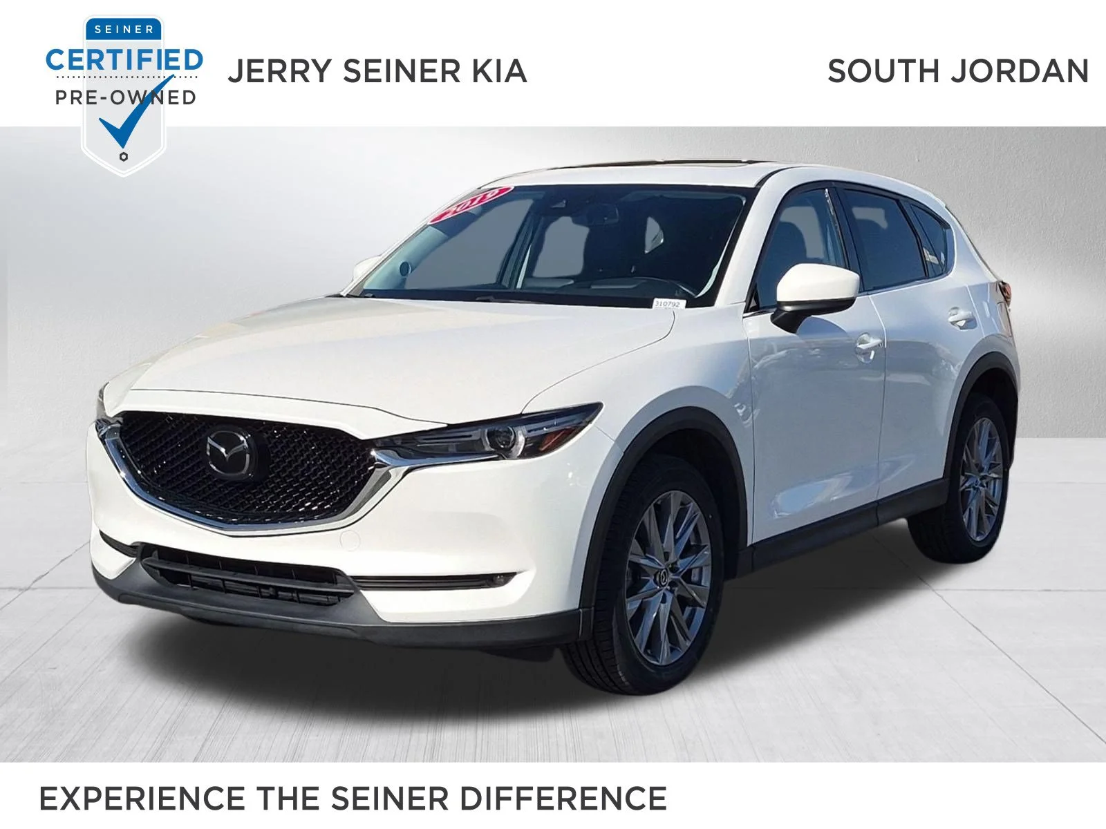 Used 2019 Snowflake White Pearl Mica Mazda Grand Touring image 1