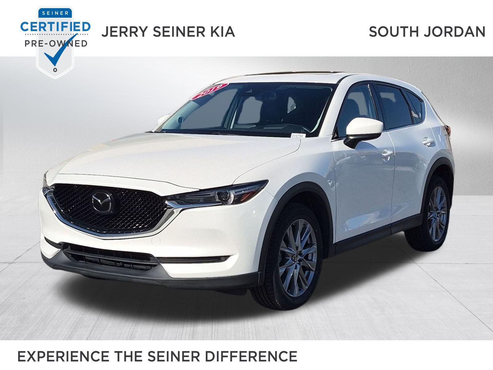 Certified Used 2019 Snowflake White Pearl Mica Mazda Grand Touring image 1