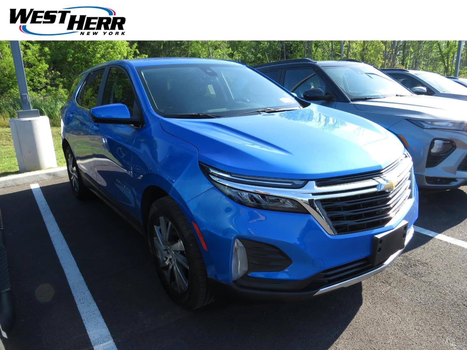 Used 2024 Riptide Blue Metallic Chevrolet LT image 1