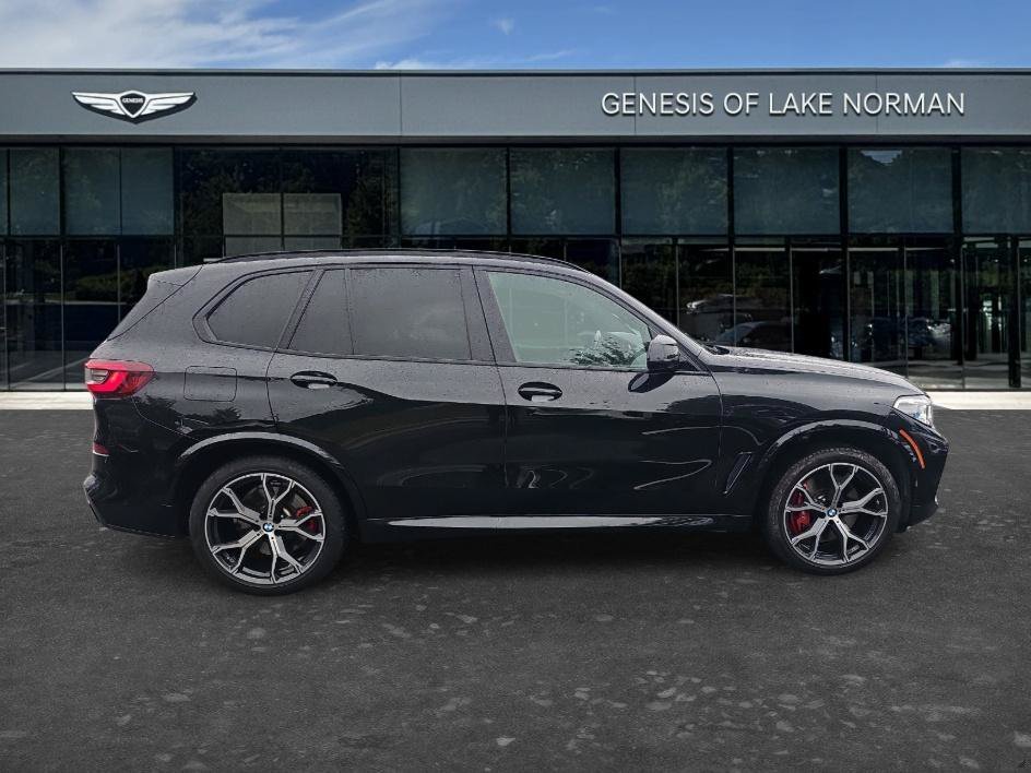 Used 2021 Black Sapphire Metallic BMW M50i image 4