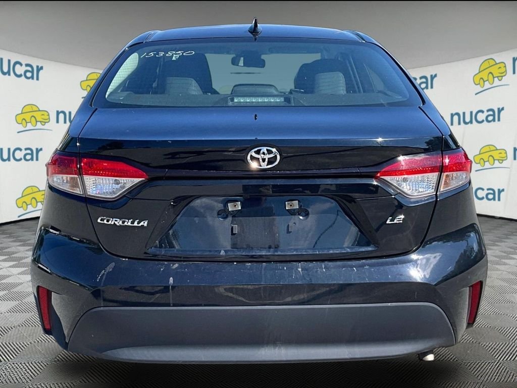 Used 2024 Black Toyota LE image 3