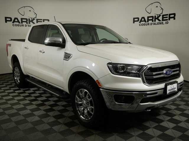 Used 2019 White Platinum Tri-Coat Ford Crew Cab LARIAT w/ FX4 Off-Road Pkg & Technology Pkg image 4