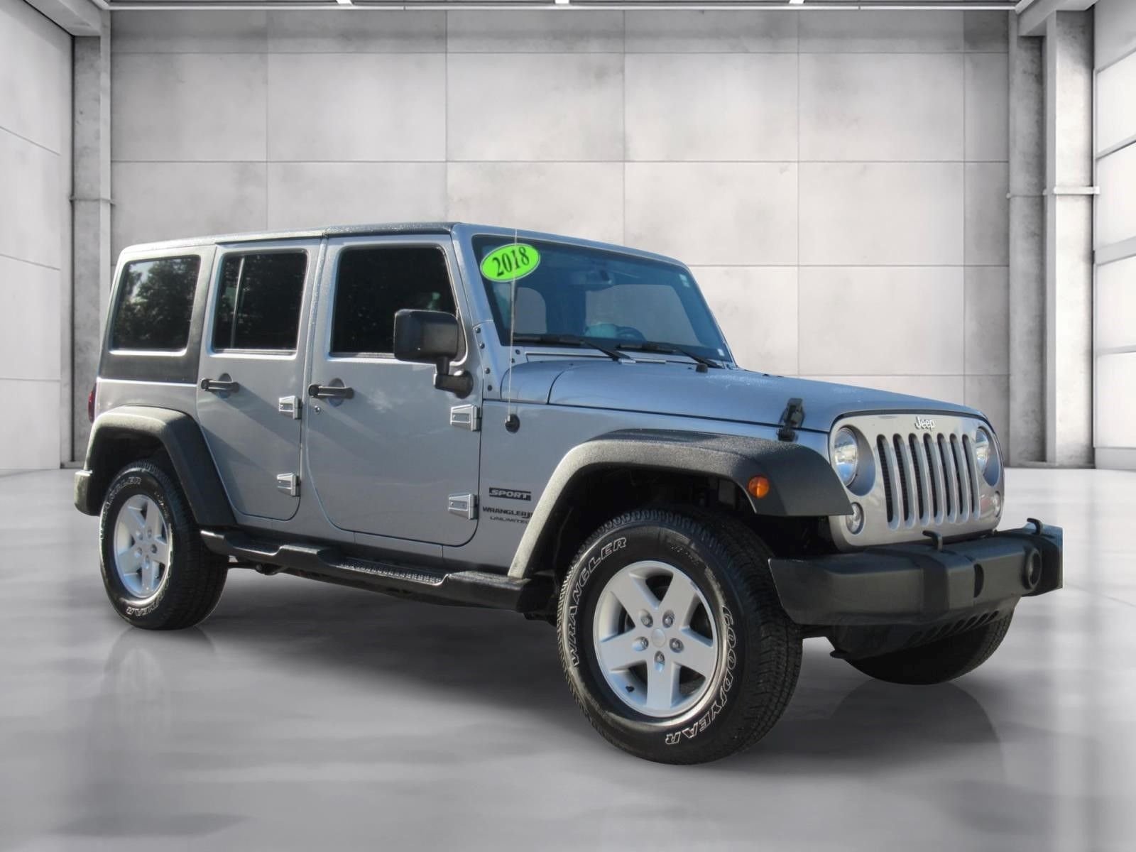 Used 2018 Silver Jeep Unlimited Sport image 1