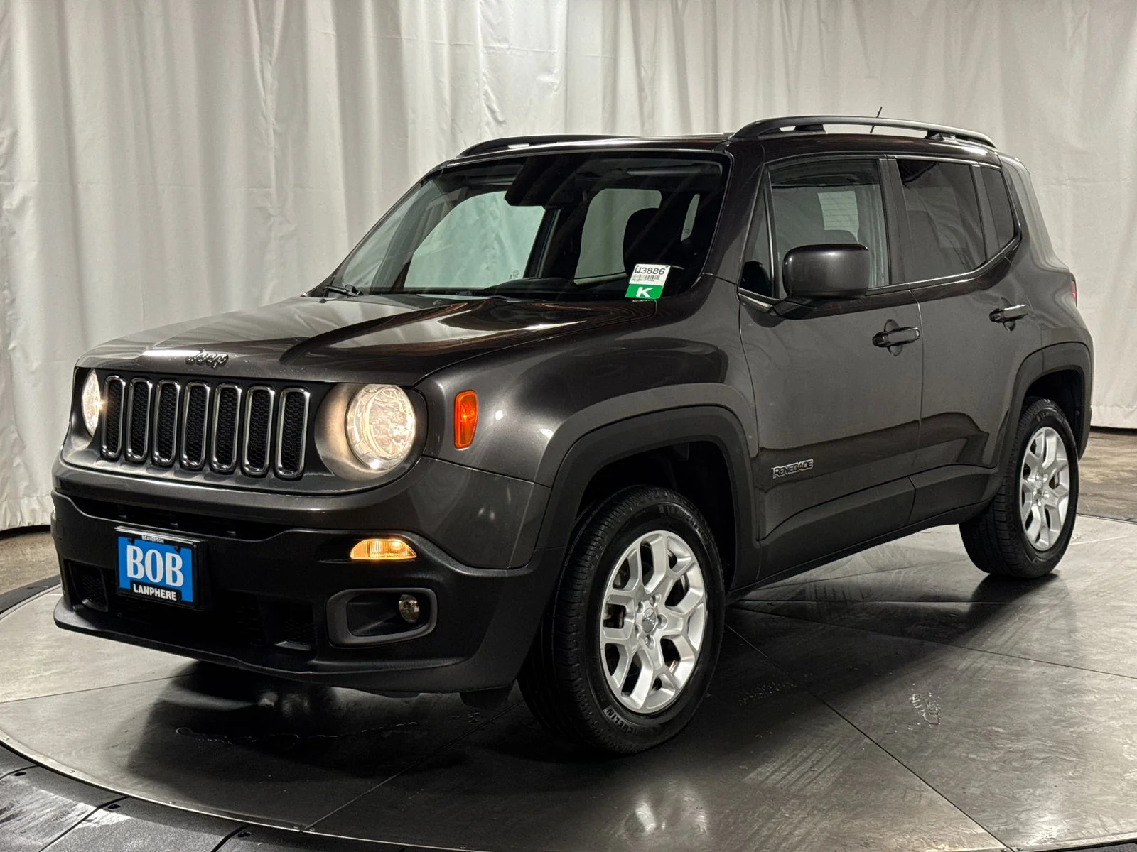 Used 2017 Granite Crystal Metallic Clearcoat Jeep Latitude image 1