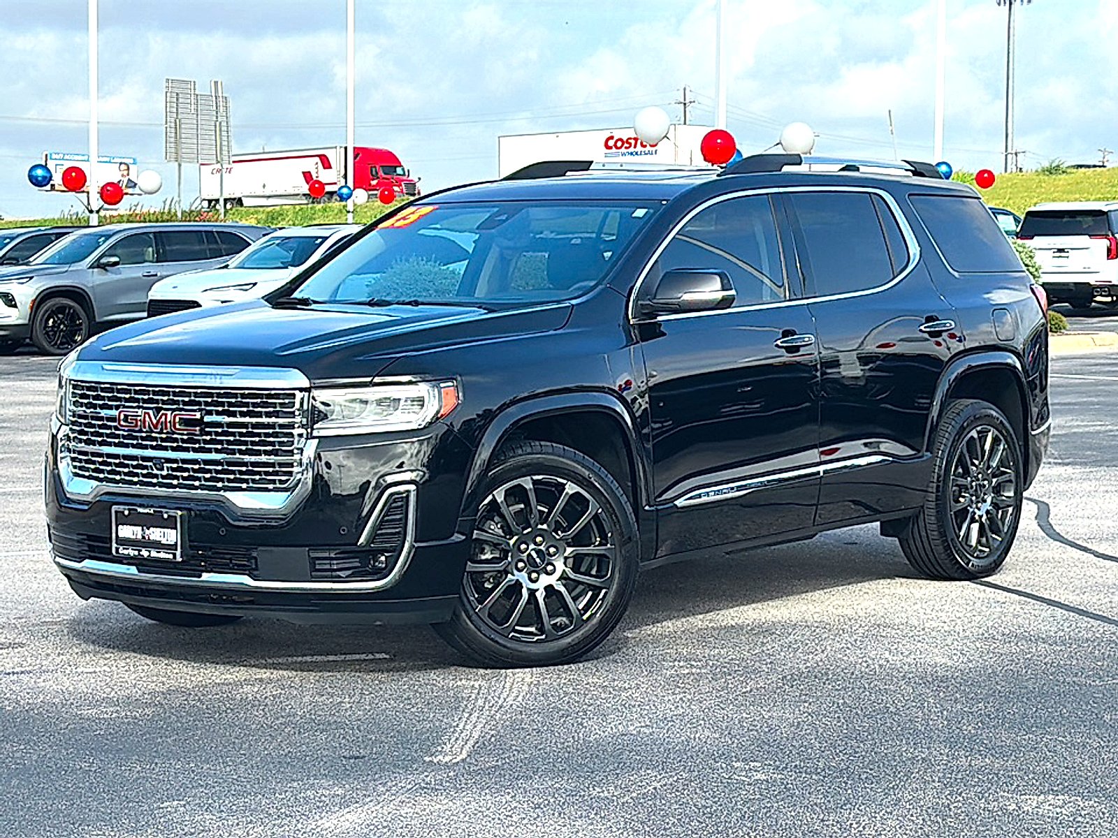 Used 2023 Ebony Twilight Metallic GMC Denali image 2