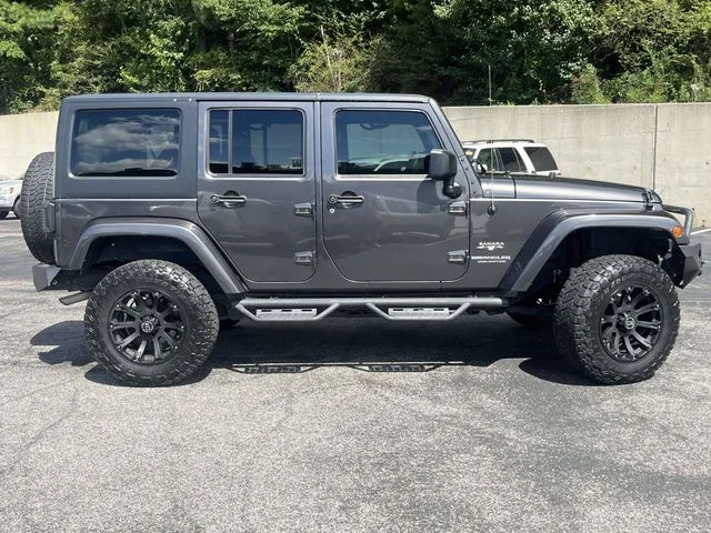 Used 2016 Gray Jeep Unlimited Sahara image 2