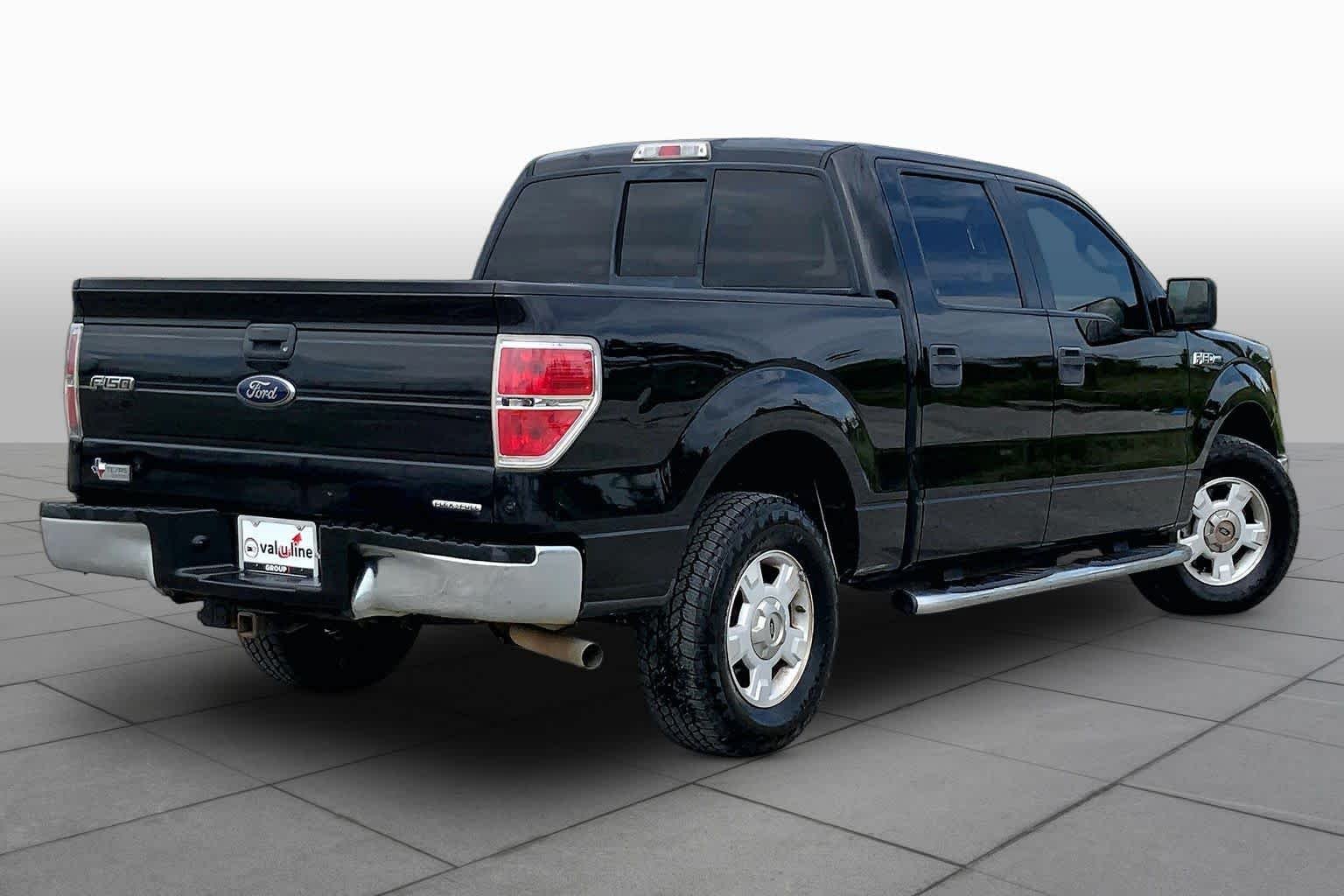 Used 2013 Tuxedo Black Metallic Ford XLT image 13