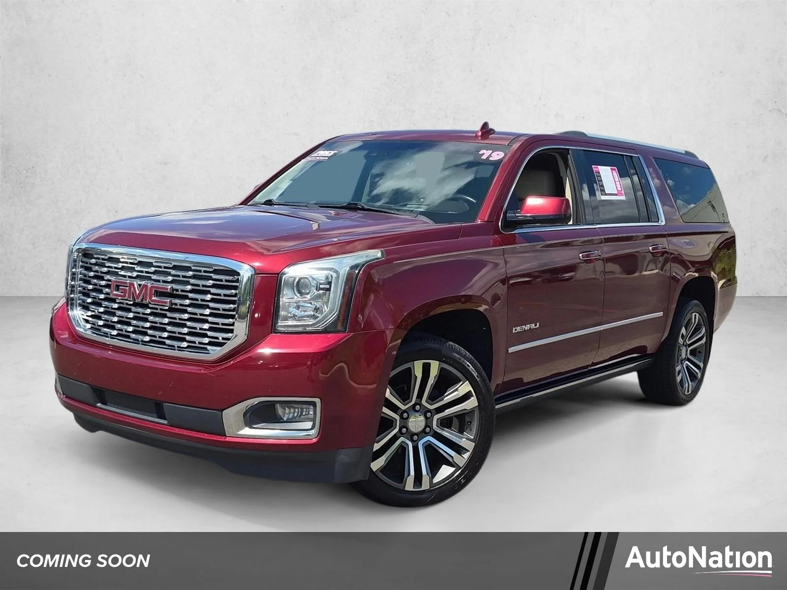 Used 2019 Crimson Red Tintcoat GMC Denali image 1