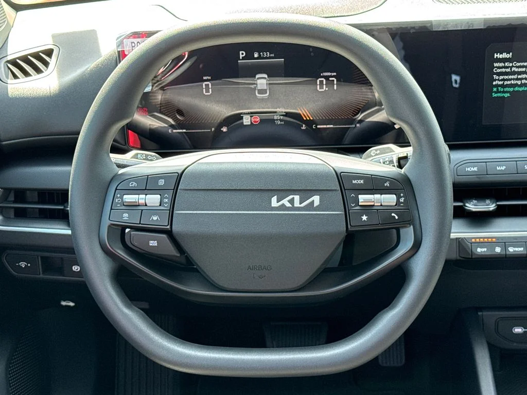 New 2026 Currant Red Kia LXS image 24
