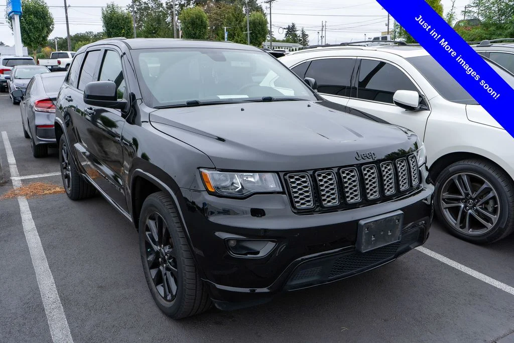 Used 2017 Diamond Black Jeep Altitude image 1