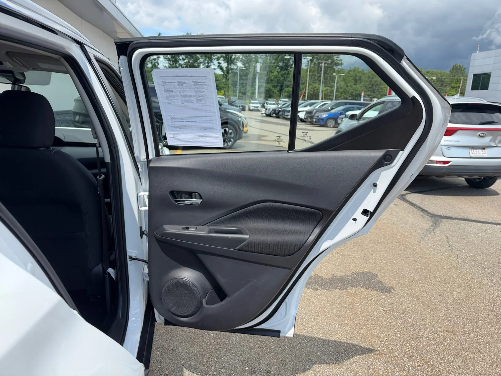 Used 2024 Aspen White Tricoat/Super Black Nissan SV image 31