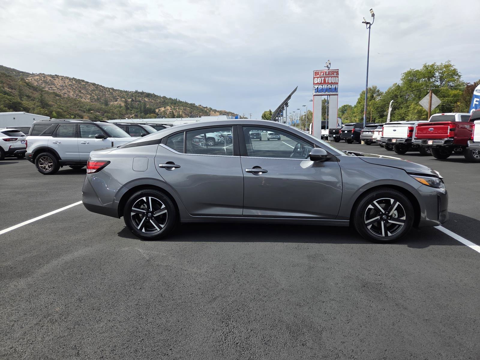 Used 2025 Gun Metallic Nissan SV image 4