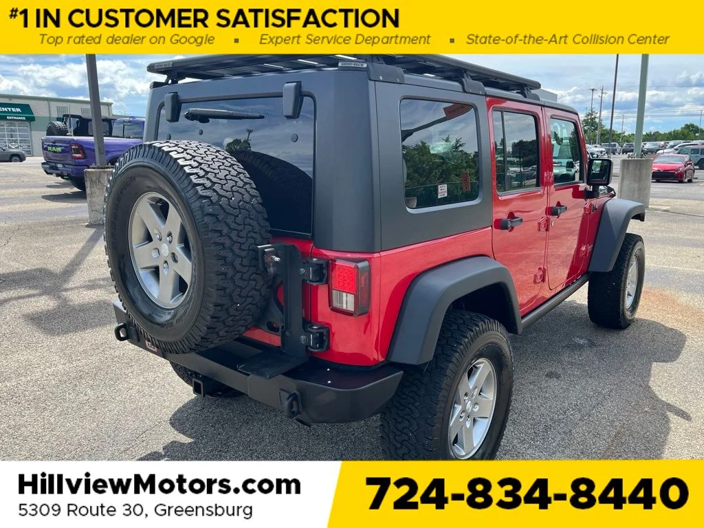 Used 2010 Flame Red Jeep Unlimited Rubicon image 5
