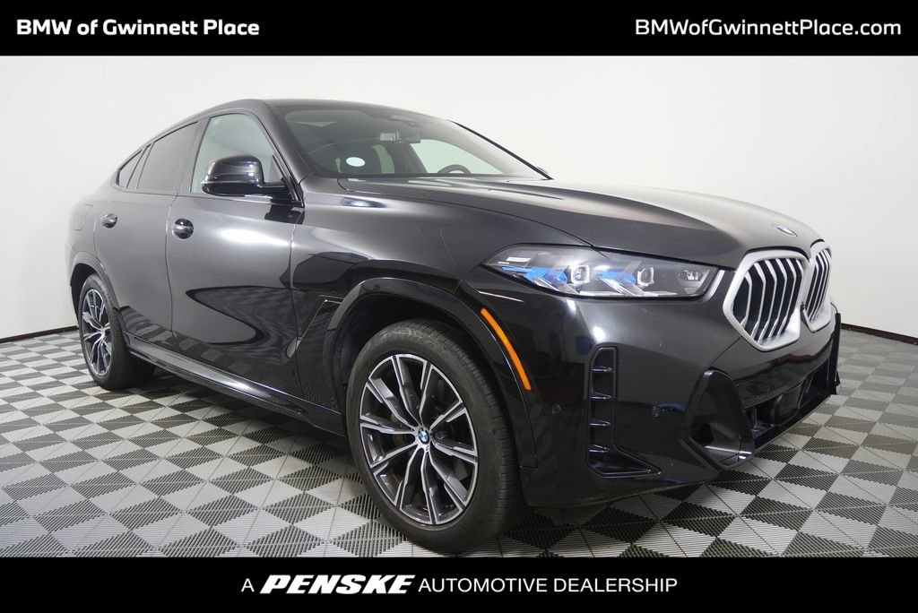 Certified Used 2025 Black Sapphire Metallic BMW xDrive40i image 1