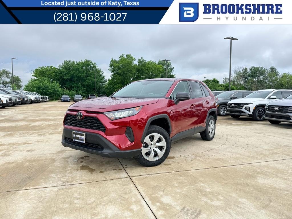 Used 2022 Ruby Flare Pearl Toyota LE image 1