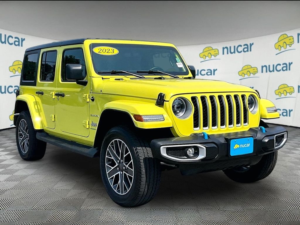 Used 2023 Yellow Jeep Sahara 4xe image 1