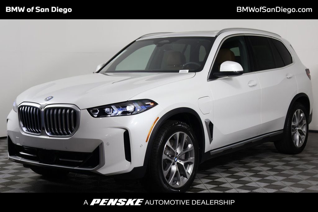 New 2026 Mineral White Metallic BMW xDrive50e image 1