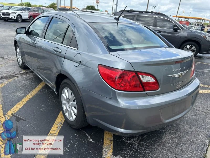 Used 2010 Silver Steel Metallic Clearcoat/Black Vinyl Top Chrysler Touring image 3