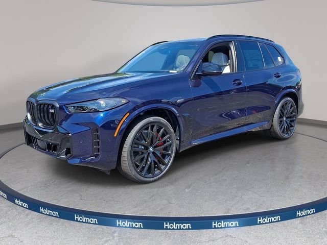 New 2026 Tanzanite Blue II Metallic BMW M60i image 1