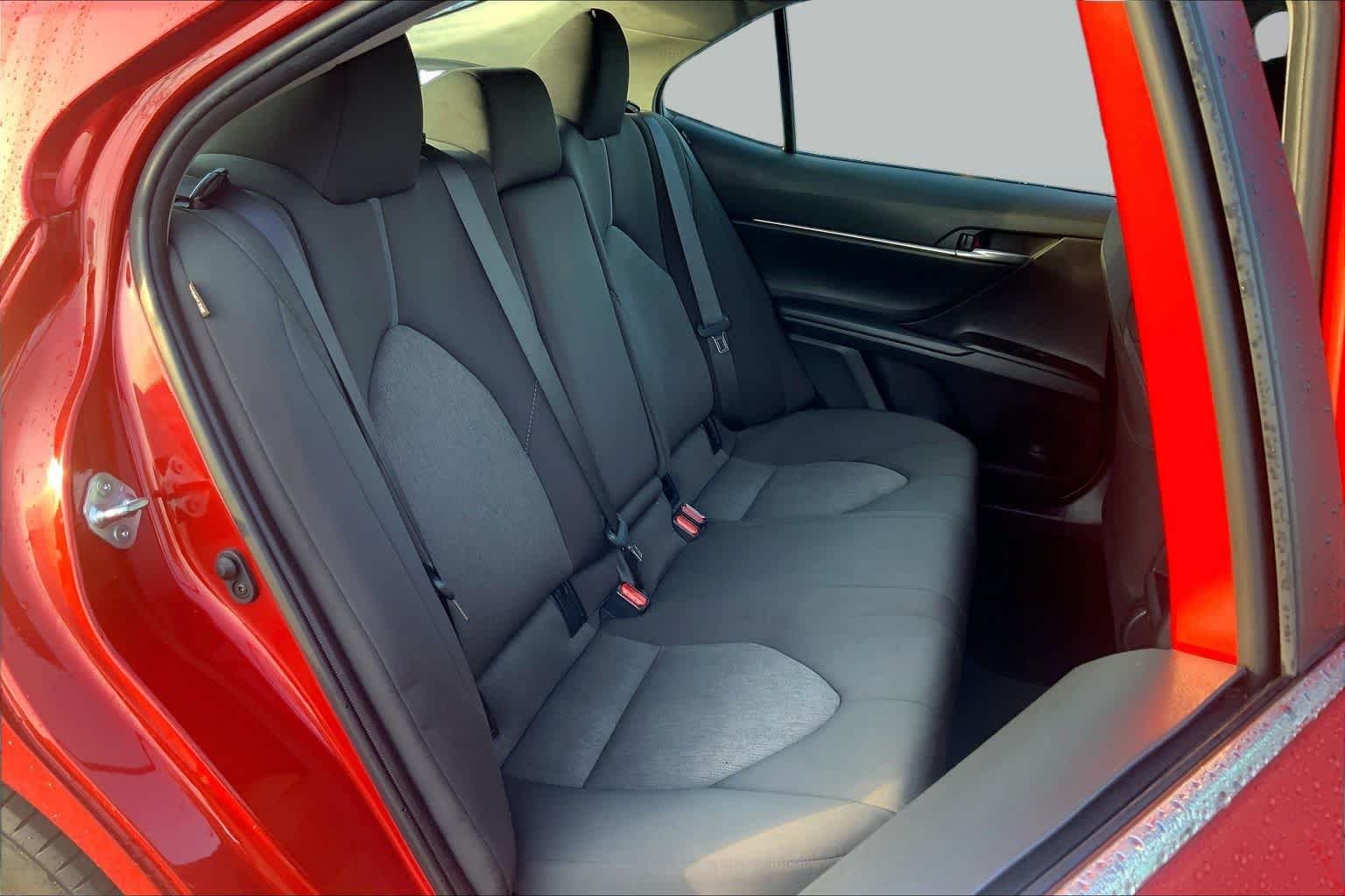 Used 2024 Supersonic Red Toyota LE image 18