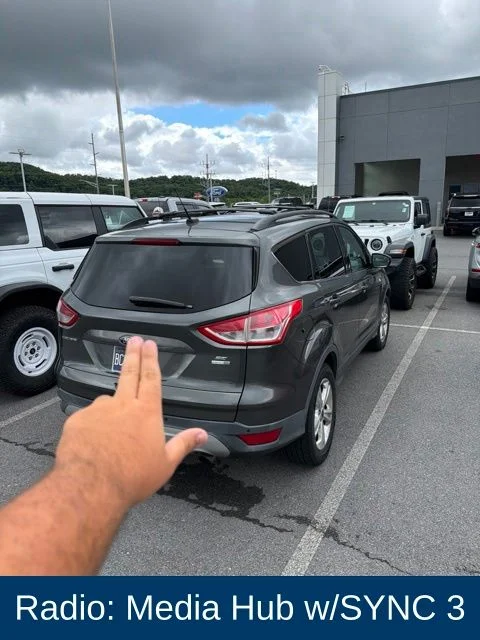 Used 2016 Gray Ford SE image 4