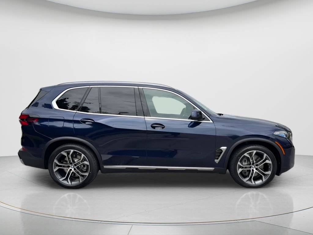New 2026 Tanzanite Blue II Metallic BMW xDrive50e image 7