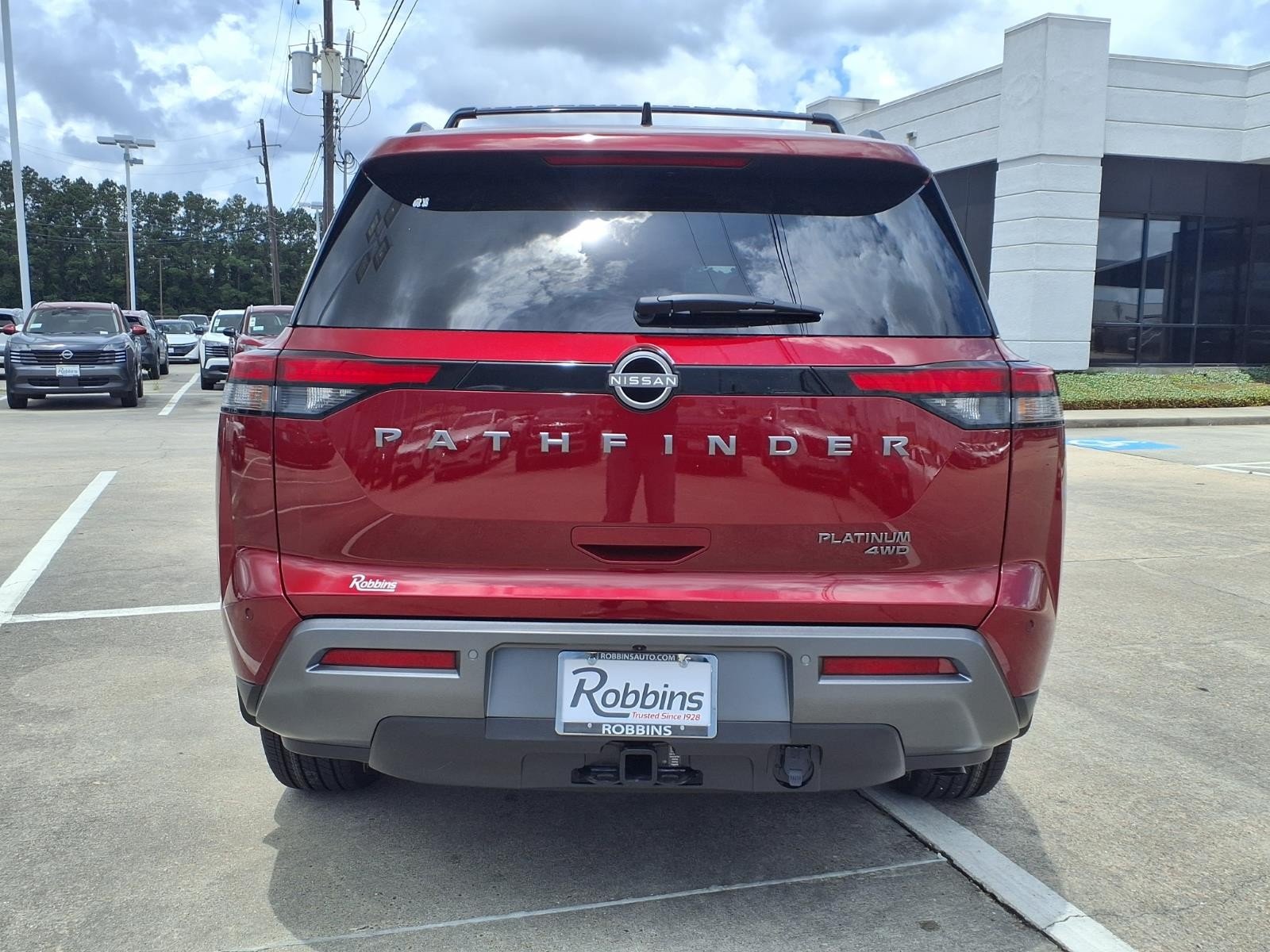 2026 Nissan Pathfinder Platinum Red at Robbins Nissan