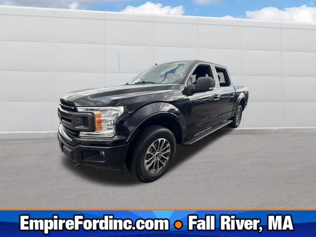 Used 2019 Agate Black Metallic Ford XLT image 1