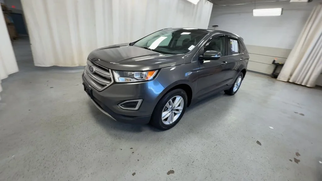 Used 2015 Magnetic Metallic Ford SEL image 5