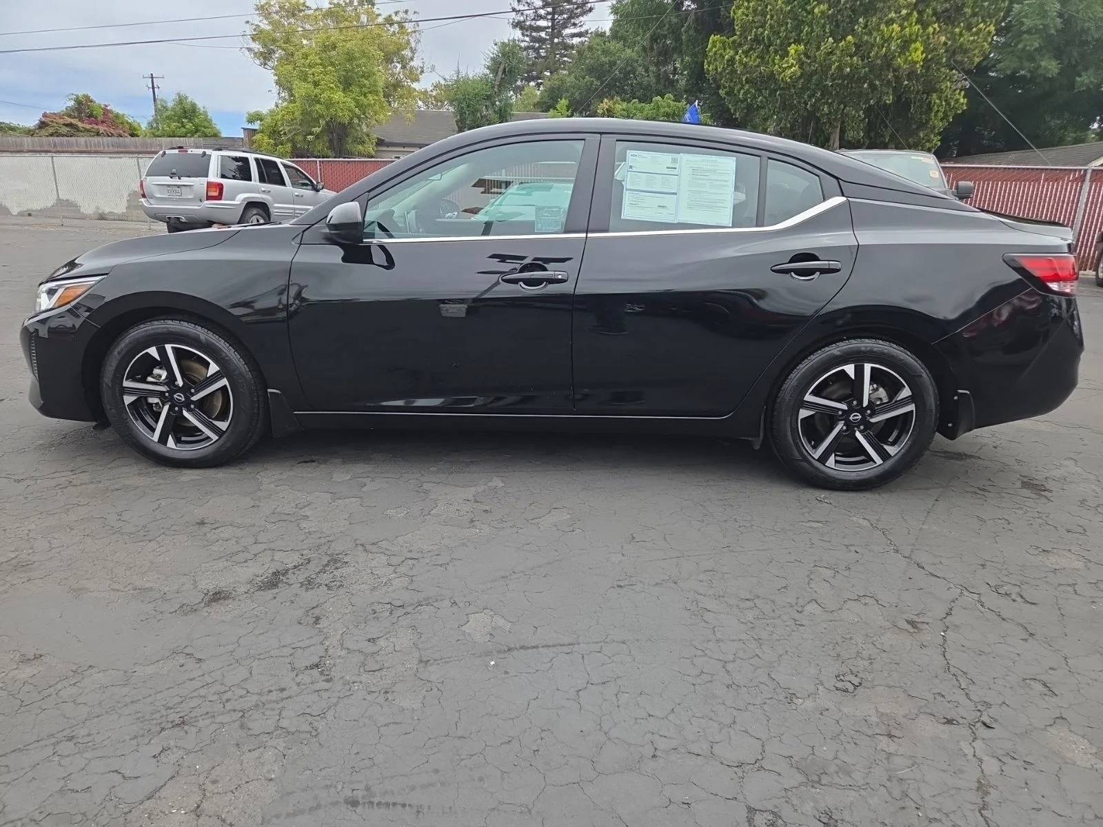Certified Used 2024 Black Nissan SV image 10