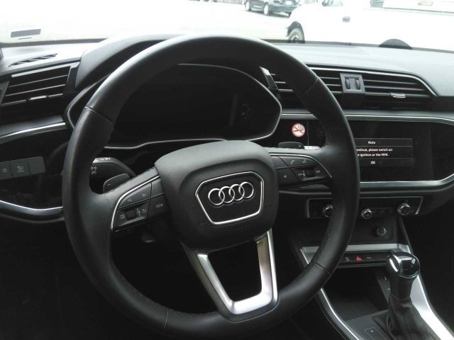 Used 2025 Navarra Blue Metallic Audi Premium image 6